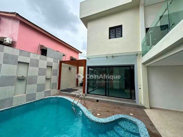 Location villa duplex 7 pièces avec piscine | Riviera golf 4 cité terre afrique — photo 2